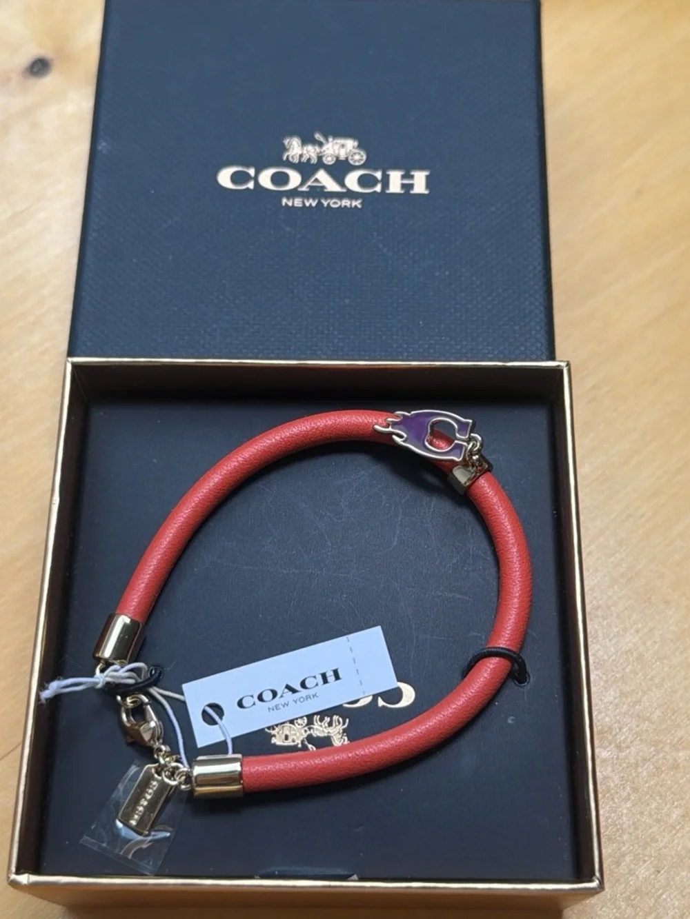 COACH Orange Leather Bracelet with Gold Hardware Brand New in a box
